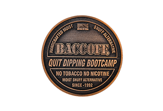 A bronze plaque that says BaccOff 100 Day Challenge Coin at dipping bootcamp.