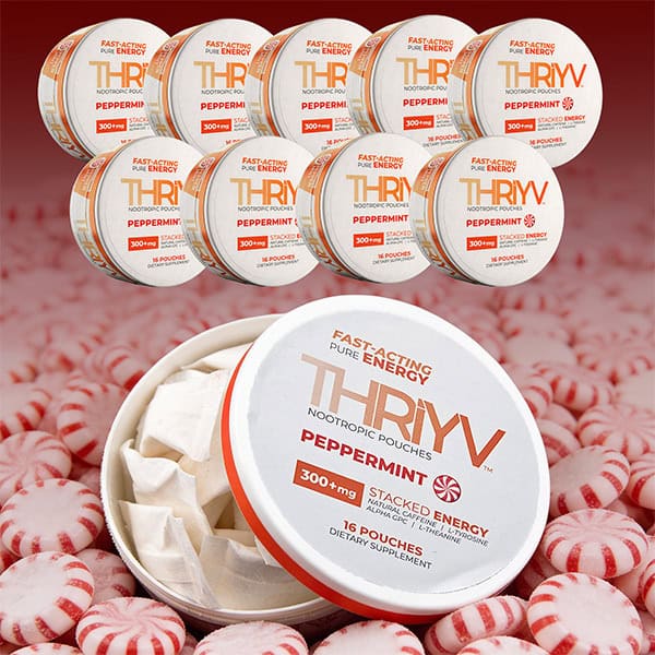 THRIYV peppermint energy pouches surrounded by peppermint candies 