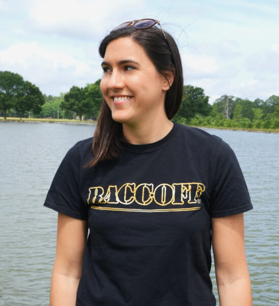 A woman wearing a BaccOff T-Shirt.